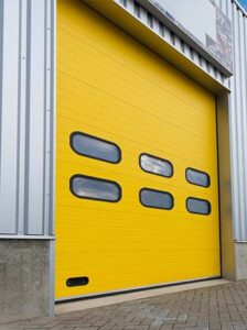 bright yellow industrial warehouse overhead door