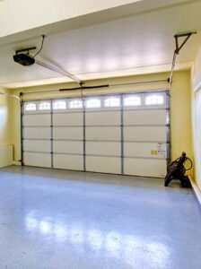 inside garage with a garage door opener attached
