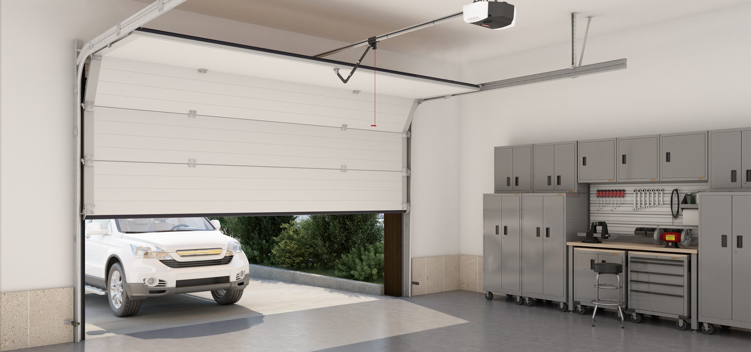 garage door opening with a car driving in to park